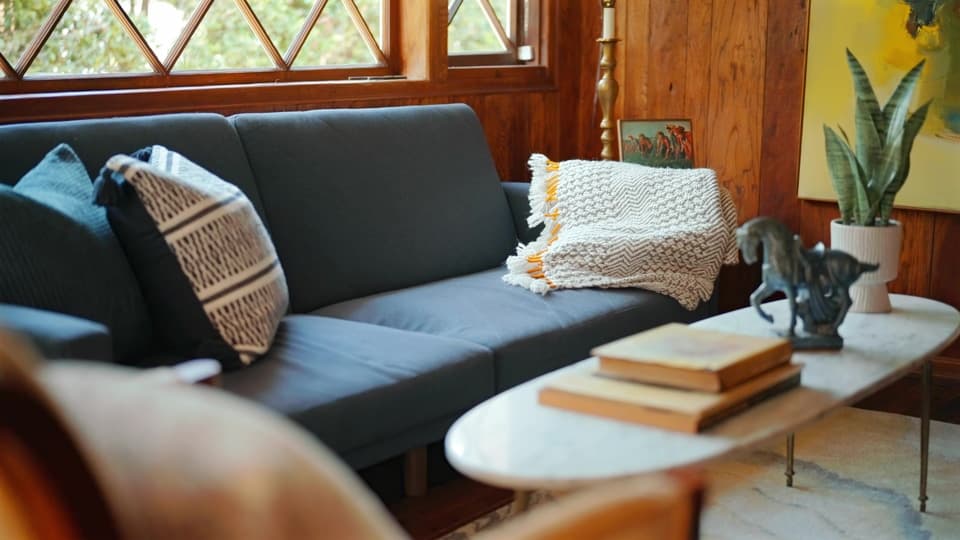 Living room seating detail from the Beverly Glen listing film
