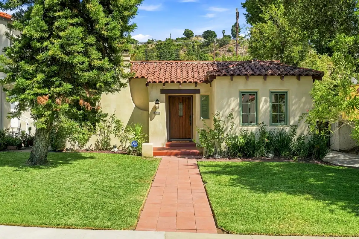 Spanish bungalow front in daylight