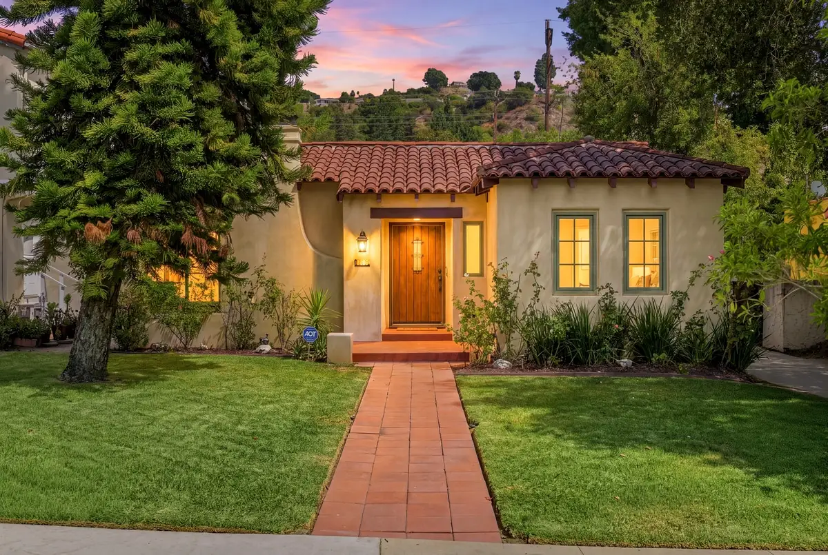 The same Spanish bungalow at twilight