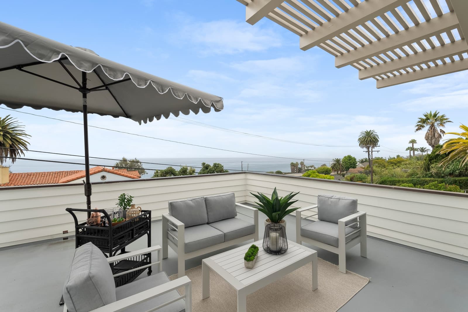 Roof deck lounge with an ocean view, Summerland
